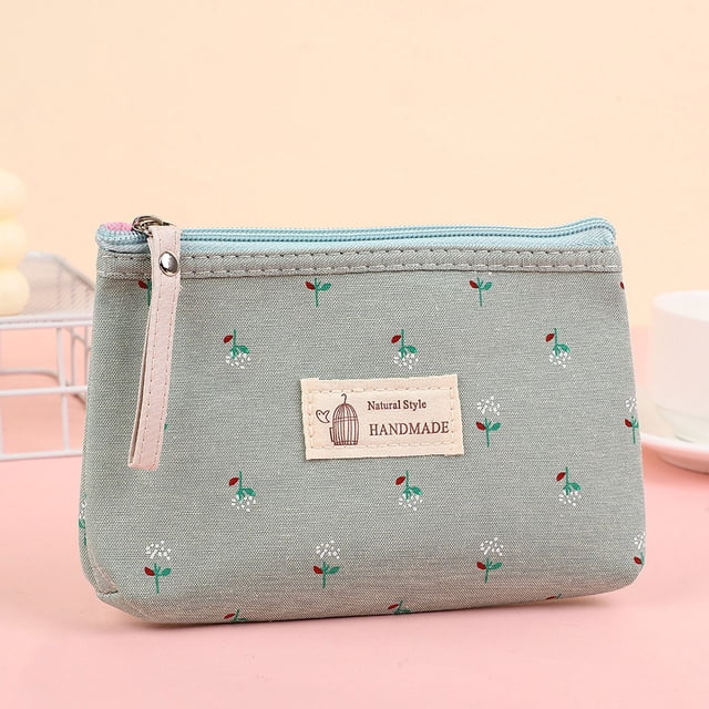 Bonita bolsa de maquillaje de lona impermeable con estampado de flores, pequeña cartera portátil para mujer