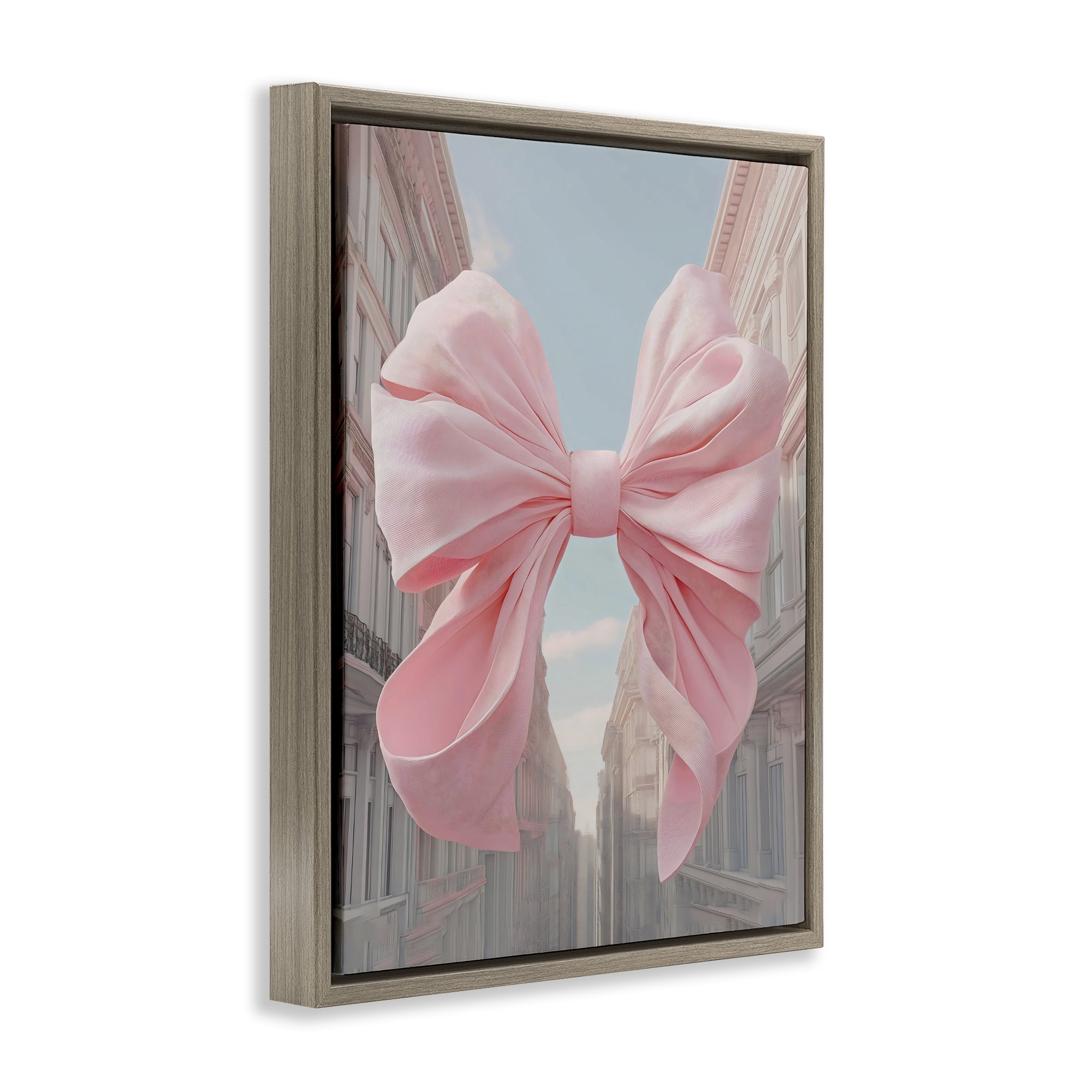 Stupell Industries Pink Bow over City Street Brown Framed Floater Canvas Wall Art, design by The Prints Vibe