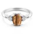 thumbnail image 2 of Gem Stone King 925 Sterling Silver Brown Tiger Eye and White Lab Grown Diamond 3-Stone Rings for Women (1.33 Cttw, Gemstone, Oval 8X6MM, Available in Size 5, 6, 7, 8, 9), 2 of 4