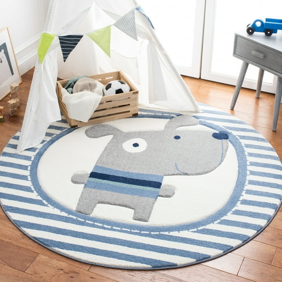 SAFAVIEH Carousel Kids Orpa The Dog Area Rug, Ivory/Blue, 5'3" x 5'3" Round