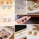 thumbnail image 3 of Juego de 8 pares de aretes de tuerca para mujer, circonita cúbica, aretes de tuerca con nudo dor, perlas sintéticas, arete simples para mujer, Circonita cúbica Acero inoxidable, cristal, 3 of 3