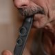 thumbnail image 1 of unbranded Instrumento Musical Kazoo Negro Doble Agujero Con Cuerda Para Colgar Y Membranas Redondas, 1 of 6