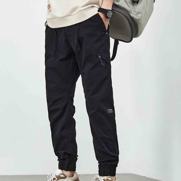 Pantalones largos de moda para hombre, casuales, de color sólido, con bolsillos y cremallera, cintura elástica, de poliéster.