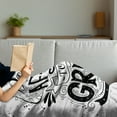 thumbnail image 3 of Saying Soft Flannel Fleece Throw Blanket, Don't Be Afraid to Be Hand Drawn Illustration with Calligraphic Letters, Cozy Plush for Indoor and Outdoor Use, 60" x 80", Black and White, by Ambesonne, 3 of 5