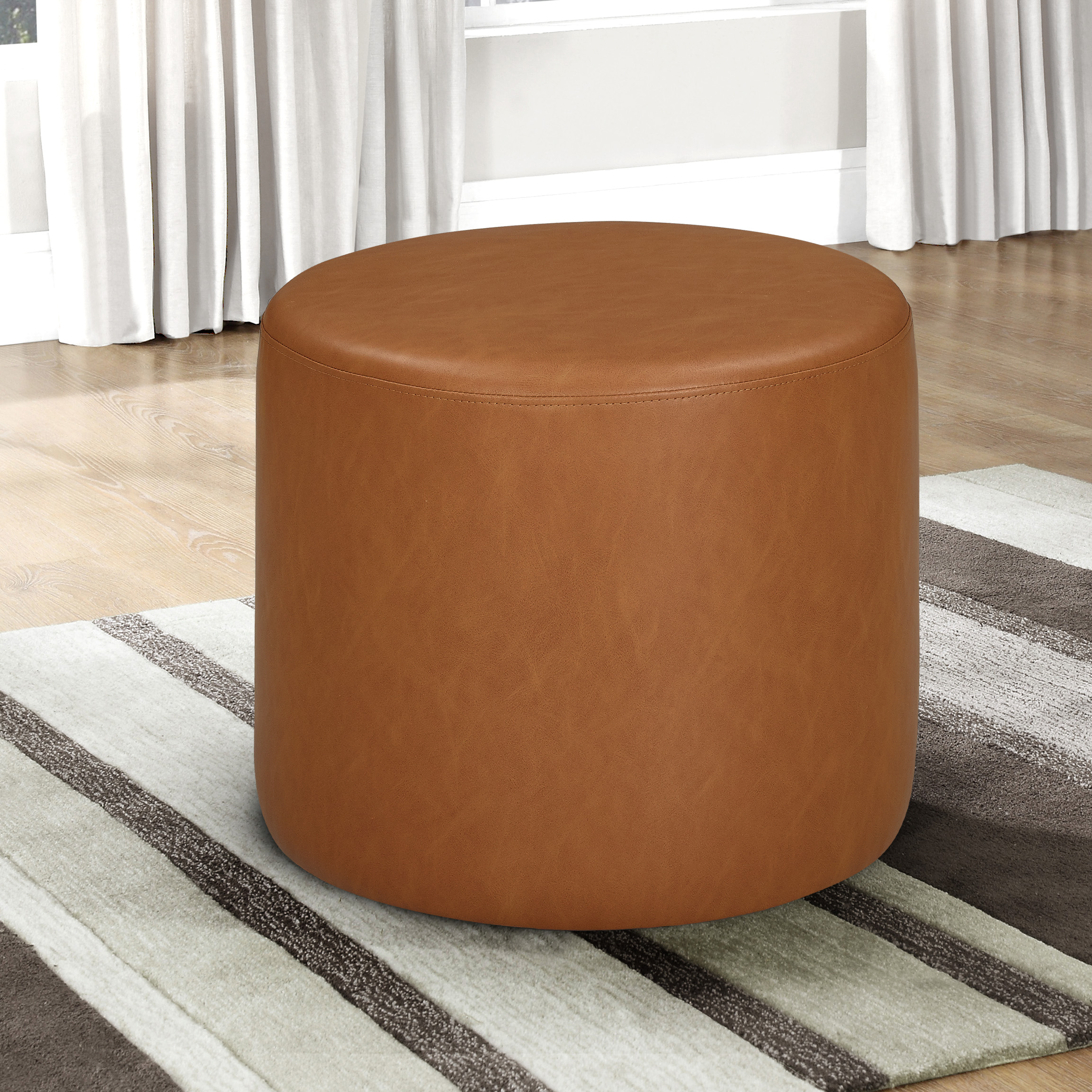 Lifestyle Solutions Warren Round Ottoman, Brown Faux Leather
