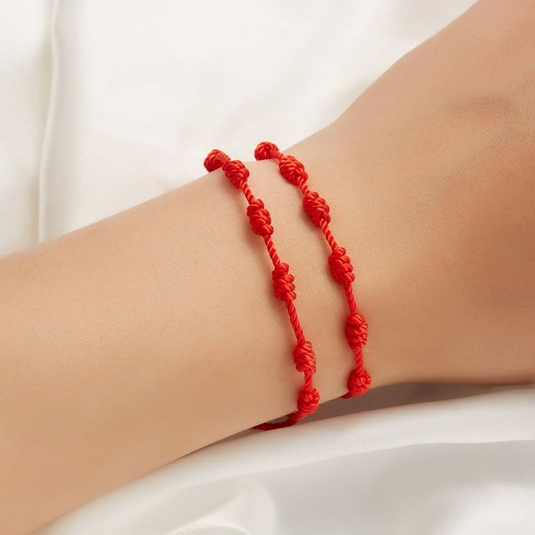 String bracelet in red colour, Fatima's hand, clear zircons, eye