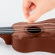 thumbnail image 4 of Ukelele infantil de 41 cm | Mini guitarra de 4 cuerdas con cuerdas ajustables | Instrumento musical de educación temprana para niños a partir de 3 años | Color rojo o café, 4 of 6