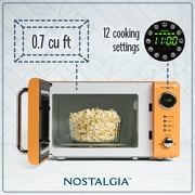 Nostalgia 0.7 cu ft Retro Microwave Oven, 700W Countertop Microwave Oven with LED Display, Orange