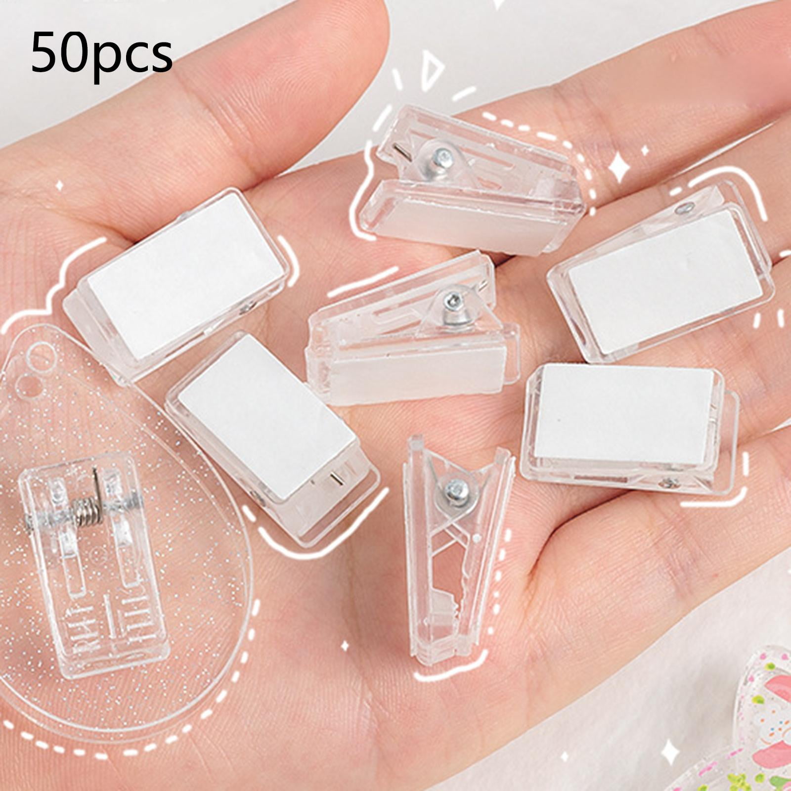 Colaxi 50pcs Self Adhesive Clips Tapestry Hangers Clips Wall Clips Photo Clips Paper Hanger Double Sided Adhesive Clips Clear 2.6cmx1.3cm