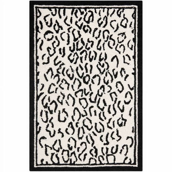 SAFAVIEH Chelsea Doriane Geometric Borders Wool Area Rug, White/Black, 4'6" x 6'6" Oval