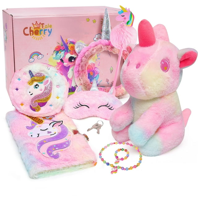 peluche de unicornio Cherry Tale con diario para niñas multicolor: vista frontal con peluche de felpa teñida sentado, diario esponjoso con cerradura en forma de corazón y llave, antifaz rosa con cuerno plateado, diadema con cuerno y pompones, bolígrafo con pompón, bolsa cruzada pequeña y collar de cuentas; caja de regalo rosa al fondo. Adecuado también para juegos de imaginación y fiestas de té.