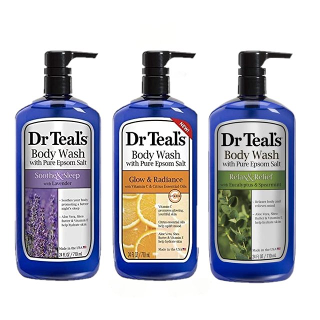 set de regalo body wash dr. teal's variety, 3 unidades de 720 ml, con aceites esenciales — frontal de tres botellas azules con dispensador: Soothe & Sleep lavanda (etiqueta lila con espigas), Glow & Radiance vitamina C y cítricos (etiqueta naranja con rodajas) y Relax & Relief eucalipto y menta (etiqueta verde con hojas); cada botella de 720 ml (24 oz) para uso en ducha y experiencia tipo spa.