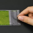 thumbnail image 3 of Bolsas de celofán de plástico verde lima con lunares (13 x 5 cm, 96-100 unidades) para regalo o aniversario., 3 of 4