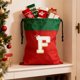 thumbnail image 4 of Bolsa de regalo navideña con cordón, 26 letras, poliéster rojo, 30 x 38 cm | Bolsa reutilizable para dulces navideños, pequeña bolsa para envolver regalos, organizador de decoración festiva, 4 of 6