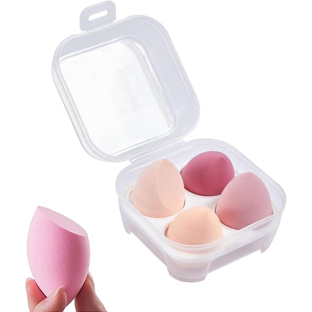 esponja de maquillaje beauty blenders, esponja facial maquillaje para bases (rosa) Pack de cuatro esponjas rosas de formas variadas en estuche plástico transparente, vista 3/4 con una esponja sostenida entre dedos; textura suave de alta densidad para difuminado de bases y correctores, uso húmedo o seco, también ideal para retoques en viaje.