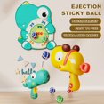 thumbnail image 1 of Juego de dardos Xeyise para niños de 3 a 8 años, juego de juguetes para interior y exterior con lanzador, 12 bolas adhesivas, imagen de dinosaurio de dibujos animados, divertido juego de fiesta,, 1 of 7