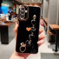 thumbnail image 3 of Phone Case for Samsung Galaxy A24 4g 6.5" with Elegant Heart Bracelet Strap Luxury Plating Cute Love Heart Cover with Hand Chain for Women Camera Protection Soft Shockproof Bumper (Black), 3 of 6