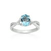 Believe by Brilliance Oval Treated Blue Topaz and CZ Twist Ring