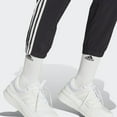 thumbnail image 4 of Women's adidas Essentials 3-Stripe Woven Joggers Color: Black Size: SMALL, 4 of 5