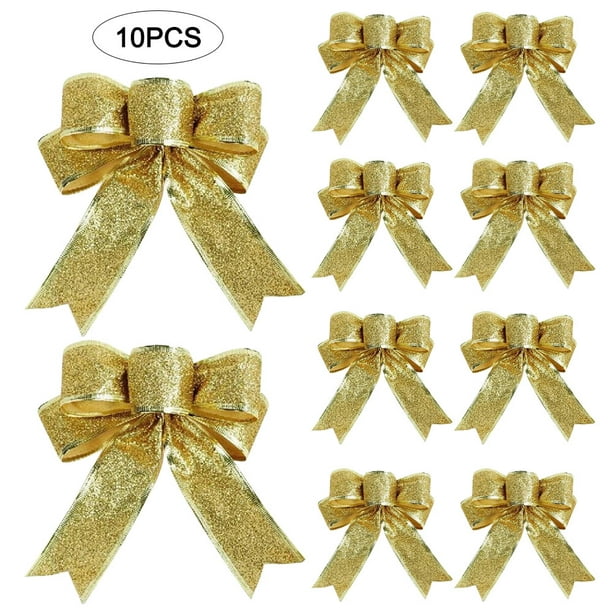 decorated christmas trees with gold ribbon