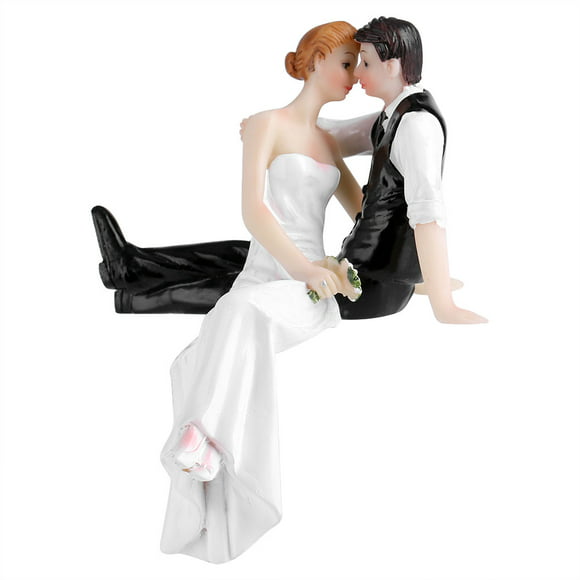 Wedding Bride And Groom Sitting Sideways And Embracing Each Other With Ornaments