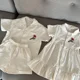 thumbnail image 5 of Conjunto de camisa de verano para niños, traje informal para hermanos, Top con flores bordadas, pantalones cortos, 2 uds., vestido con solapa de un solo pecho para niñas, 5 of 6