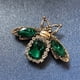 thumbnail image 1 of Broche de abeja con diamantes de imitación dorados XianweiShao moda cristal vintage circonita cúbica verde esmeralda, 1 of 5