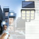 thumbnail image 1 of Lámpara solar de pared con sensor de movimiento | Luz LED COB para exteriores, con energía solar, para jardín, patio, garaje y control remoto | Resistente al agua, con 3 modos de brillo ajustables, 1 of 7