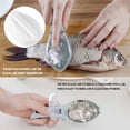 thumbnail image 2 of (Azul) La herramienta doméstica para quitar escamas de pescado viene con una caja de almacenamiento de escamas de pescado., 2 of 5