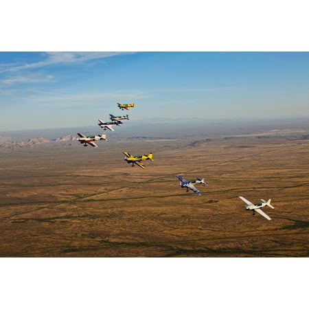 Extra 300 aerobatic aircraft fly in formation over Mesa Arizona Stretched Canvas - Scott GermainStocktrek Images (18 x