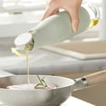 thumbnail image 2 of Bearachild Dispensador de aceite con anillo de silicona para verter aceite a prueba de fugas La botella de aceite se abre y se cierra Cocina y Comedor blanco, 2 of 6