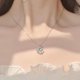 thumbnail image 2 of Collar de cristal de circón brillante para mujeres y adolescentes, collar con colgante de sol y luna de galaxia con cielo estrellado azul, collar de estrella simple y moderno., 2 of 3