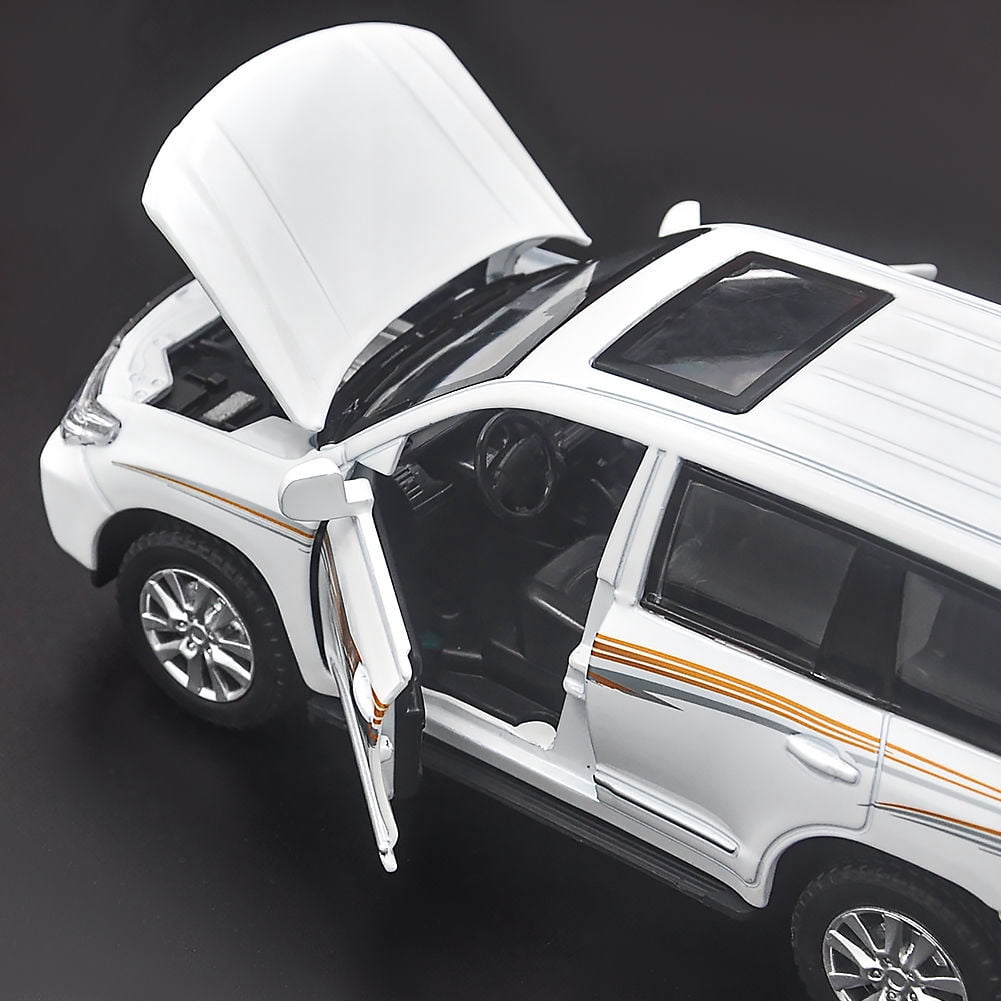 1:32 scale Toyota Land Cruiser Prado die-cast car model with opening doors, lights, sound and spring return function. Birthday gift toy car for boys.