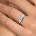 thumbnail image 4 of Gem Stone King 14K White Gold Blue Zircon & White Moissanite 3-Stone Engagement Ring | 1.31 Cttw | Round 5MM and 4MM | Three Stone Wedding Anniversary Promise Ring for Women (Size 7), 4 of 6