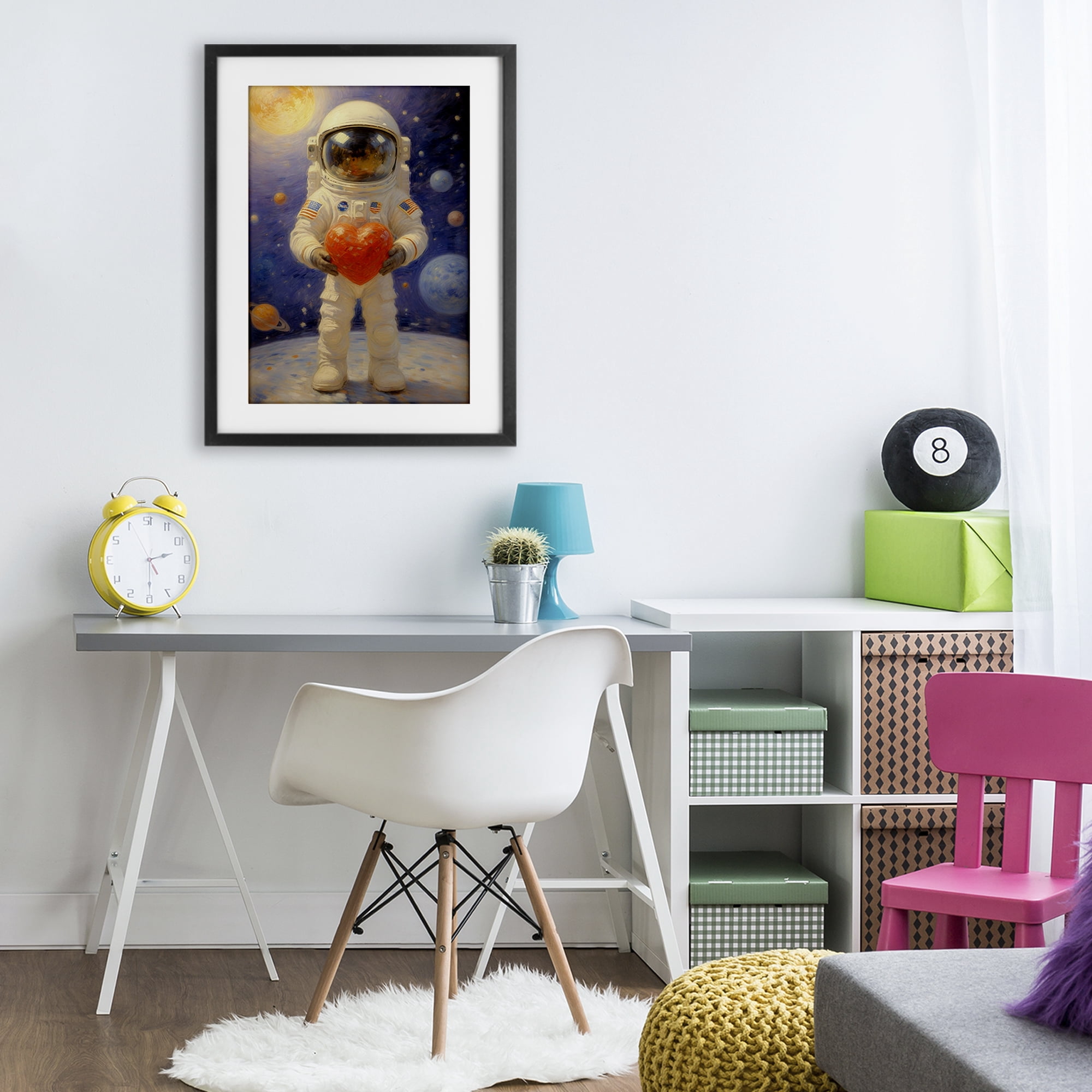 Astronaut Holding Heart Black Framed Print Under Glass, design by Angie Hawke