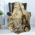 thumbnail image 4 of Eiffel Tower Soft Flannel Fleece Throw Blanket, Timeworn Grungy Wall Image with Paris Lettering and Famous Landmark, Cozy Plush for Indoor and Outdoor Use, 70" x 90", Brown Beige, by Ambesonne, 4 of 5