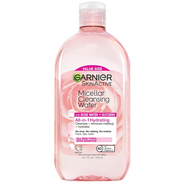 limpiador facial y desmaquillante garnier micellar water 700 ml Botella frontal de 700 ml con solución micelar rosada Garnier SkinActive, etiqueta indicando agua de rosas y glicerina, limpiador hidratante todo en uno que elimina maquillaje sin frotar ni enjuagar, tapa de plástico, fondo blanco; adecuada también como desmaquillante de viaje.