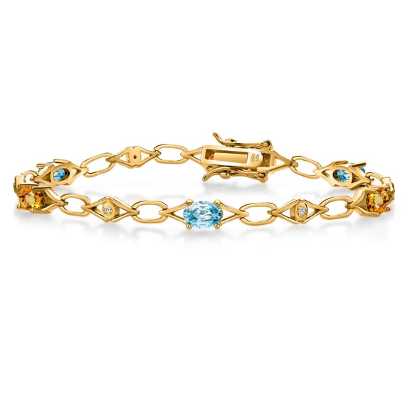 Gem Stone King 18K Yellow Gold Plated Silver Blue Zircon and Yellow Sapphire and Round White Lab Grown Diamond Tennis Bracelet for Women (3.83 Cttw, Gemstone Birthstone, Oval 6X4MM, 7.25 inches)
