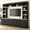 Black, variant on Harper & Bright Designs Farmhouse Wall Unit Entertainment Center 4-Piece with Bookshelves, Media Console with Adjustable Shelves, Large TV Stand with Storage for 75" TV, Black