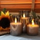 thumbnail image 5 of Velas LED sin llama con cera real, luz blanca cálida parpadeante para decoración de bodas en festivales, LED de ahorro de energía que garantizan un brillo infinito (3 piezas), 5 of 7