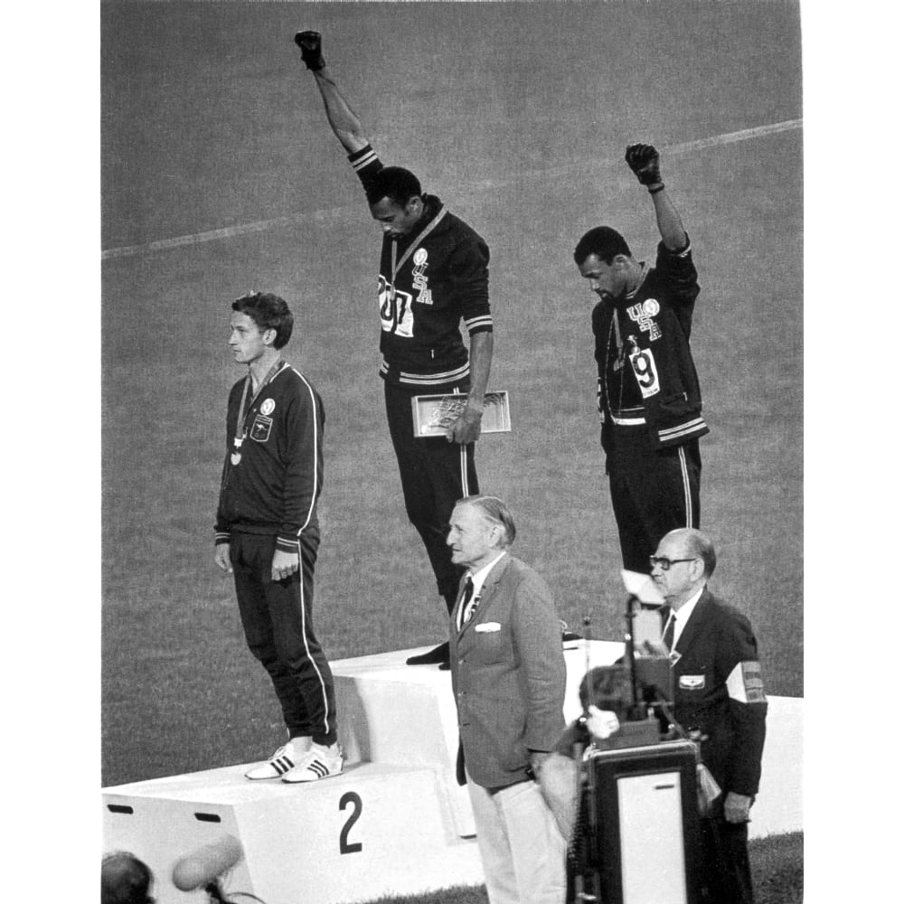 Tommie Smith And John Carlos Making A Black Power Salute During The ...