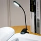 thumbnail image 1 of Lámpara de lectura LED recargable con clip, modos de brillo y colores, ideal para leer en la cama y viajar., 1 of 5