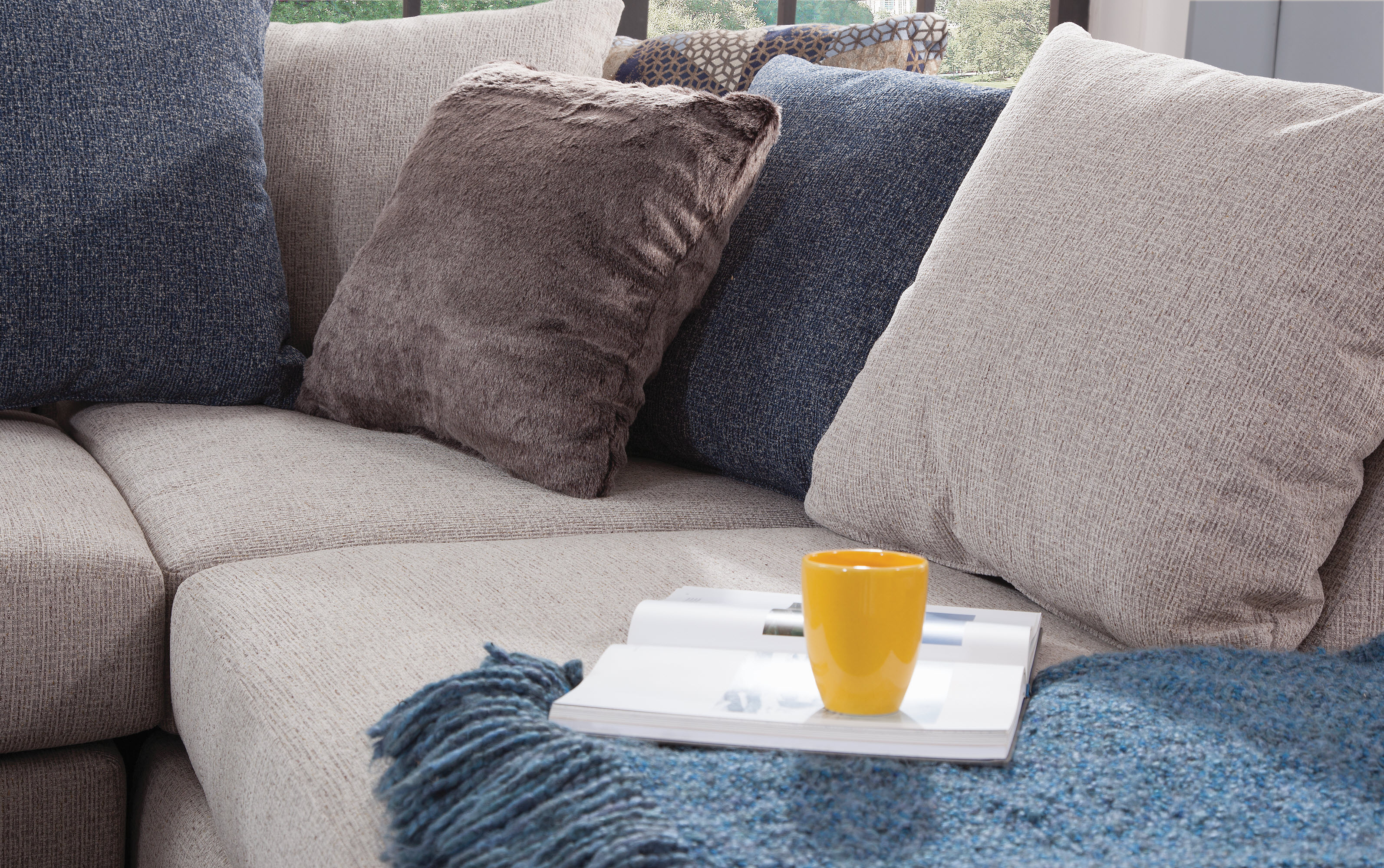 American Furniture L Shaped Sectional Sofa with 9 Loose Back Pillows and 2 Accent Pillows
