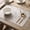 B, variant on Snmubt Embossed Daisy PVC Placemats, Waterproof Heat Resistant Table Mats for Dining Table Kitchen Home Table Decorations