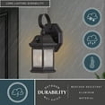 thumbnail image 3 of Wellington Aluminum 6-in. 1 Light Dusk to Dawn Medium Bronze Outdoor Wall Lantern Clear Glass, 3 of 11