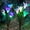 2 PACK, variant on Outdoor Solar Lights Decorative LED Flowers - Pack of 4 Solar Lilies Patio Décor Purple & White Solar Powered Garden Decoration Lights -Backyard Lighting – Waterproof Lily Flower