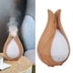 thumbnail image 1 of Humidificador Difusor De Aroma De 200 Ml, 7 Luces LED De Colores, Control Remoto, Funcionamiento Silencioso Para El Hogar, Material ABS, Humidificación De 35 DB, Potencia De 8 W,, 1 of 7