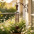 thumbnail image 1 of Campana de viento metálica para decoración colgante de jardín y exteriores | Produce sonidos suaves y claros con el viento | Crea un ambiente tranquilo para balcón, patio o terraza, 1 of 6