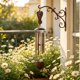 thumbnail image 1 of Campana de viento metálica para decoración colgante de jardín y exteriores | Produce sonidos suaves y claros con el viento | Crea un ambiente tranquilo para balcón, patio o terraza, 1 of 6
