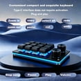 thumbnail image 1 of A Compact And Sturdy Mechanical Keyboard Featuring a 10-Key And 12-Key Layout with 2 Knobs, Designed for Portability And Minimal Desktop Footprint, 1 of 12